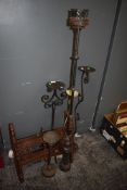 Five cast metal outside or other candle sticks including torchere style and also Bohemian table