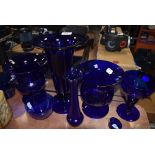 A fine selection of deep blue Bristol blue art glass in various forms