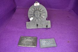 Three antique 19th century fire or police lead cast insurance plaques including Tomar Works