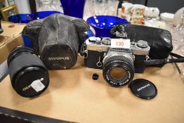 An Olympus OM-1 with Olympus Zuiko 35-105mm lens