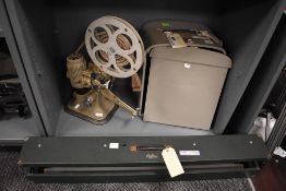 A Bell and Howell 613 16mm projector and wooden cased Celfix screen