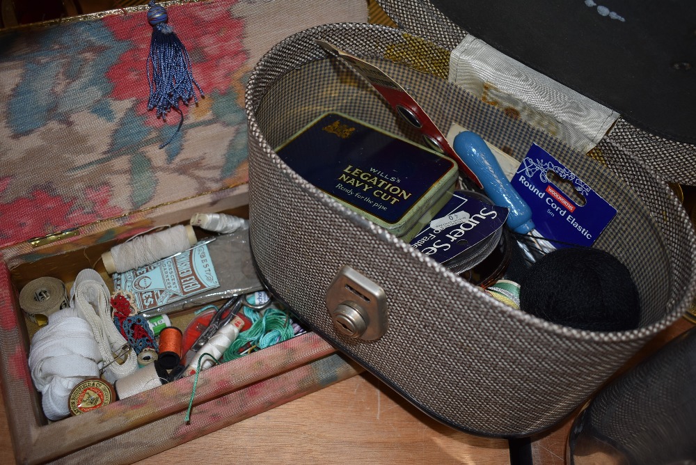 Two sewing box containing a selection of haberdashery and dress making items