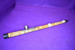 A Chinese opium smokers pipe having bone carved body decoration with metal dragon decorated fitments