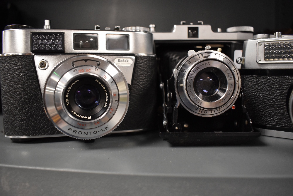 Three cameras. A Rank Mamaya with a Mamiya Komina 40mm lens, a Zeiss Ikon Nettar with Novar- - Image 2 of 3