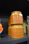 Four Hornsea pottery 'Saffron' storage jars including tea and coffee.