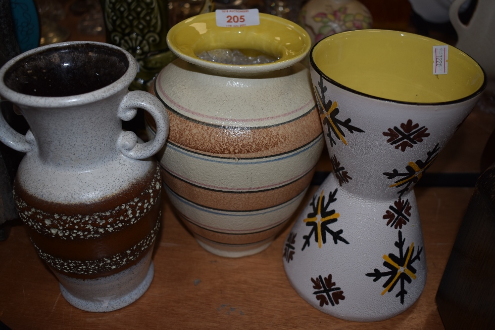 Three pieces of mid century studio pottery by West German ceramics including fat lava style