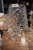 A clear cut crystal lamp base and light shade