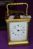 A mid 19th century brass cased carriage clock having visible escape mechanism with visible movements