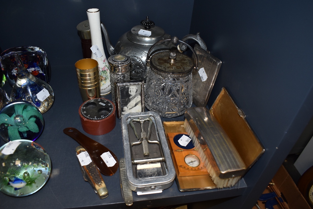 A selection of curios and trinkets including Rolls Razor strop and decorated pewter tea pot