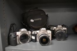 Three Minolta Cameras including two Dynax 500SI and a 404S