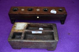 A late 19th century opium smokers or similar apothecary wooden mix pot and similar rack