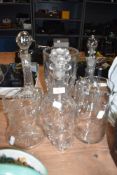 A selection of late Victorian cut and blown decanters and similar water jugs with vase also