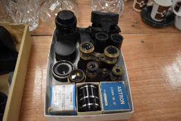 Three pairs of Opera glasses and binoculars, two extention tubes, a Tokina 70-210mm lens a