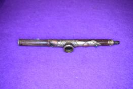 An antique opium smokers bamboo shafted pipe with brass copper and white metal detailing with