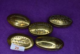 Five brass cast Late Victorian pill or snuff case including Neath Golynos River Bridge Leominster