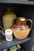 A Doulton Lambeth salt glazed jug having relief pattern of windmills and people working, also