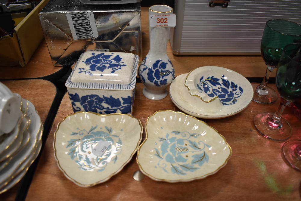 Five Bursley ware items all signed Charlotte Rhead to underside including two pin dishes and ash