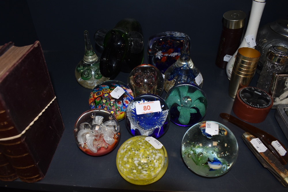 A selection of art glass and Murano style paper weights including tear drop designs and fish themed