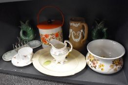 A mixed lot of vintage items including chamber pot, fish shaped vases, biscuit barrel and more.