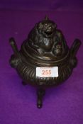 A late 19th century Chinese bronze incense burner one three footed base having dog of Fo lid and