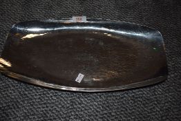 An elongated arts and crafts bowl by Keswick school of industrial arts having hammered finish