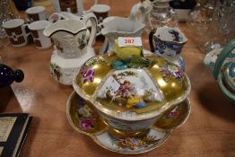 A porcelain soup tureen having cover and dish also bearing a 1720 Meissen mark and three water jugs