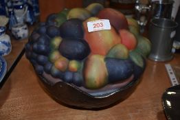 A fruit bowl in the style of a fruit bowl being glass cast and decorated