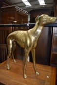 A life size brass greyhound/whippet, max height approx. 75cm