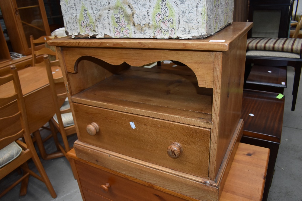 A yellow pine media stand with single under drawer