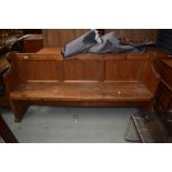 A late Victorian pitch pine church bench or vernacular settle