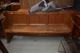 A late Victorian pitch pine church bench or vernacular settle