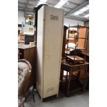 A genuine vintage metal gym or bathroom slim line locker