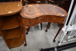 An early to mid 20th Century walnut kidney shaped dressing or side table, on cabriole legs, small