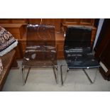 Two near matching chrome and perspex dining chairs, of early 1970's design, and a pair of designer
