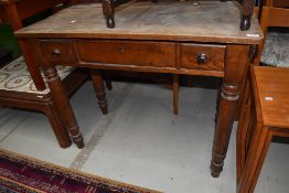 A Victorian oak side table/desk, on turned frame , in need of some restoration, dimensions approx.