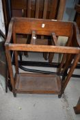 An early 20th Century oak stick/umbrella stand, with metal drip tray, width approx. 46cm