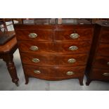 A 19th Century mahogany bow fronted chest of two over three flame fronted drawers, width approx.