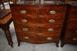 A 19th Century mahogany bow fronted chest of two over three flame fronted drawers, width approx.