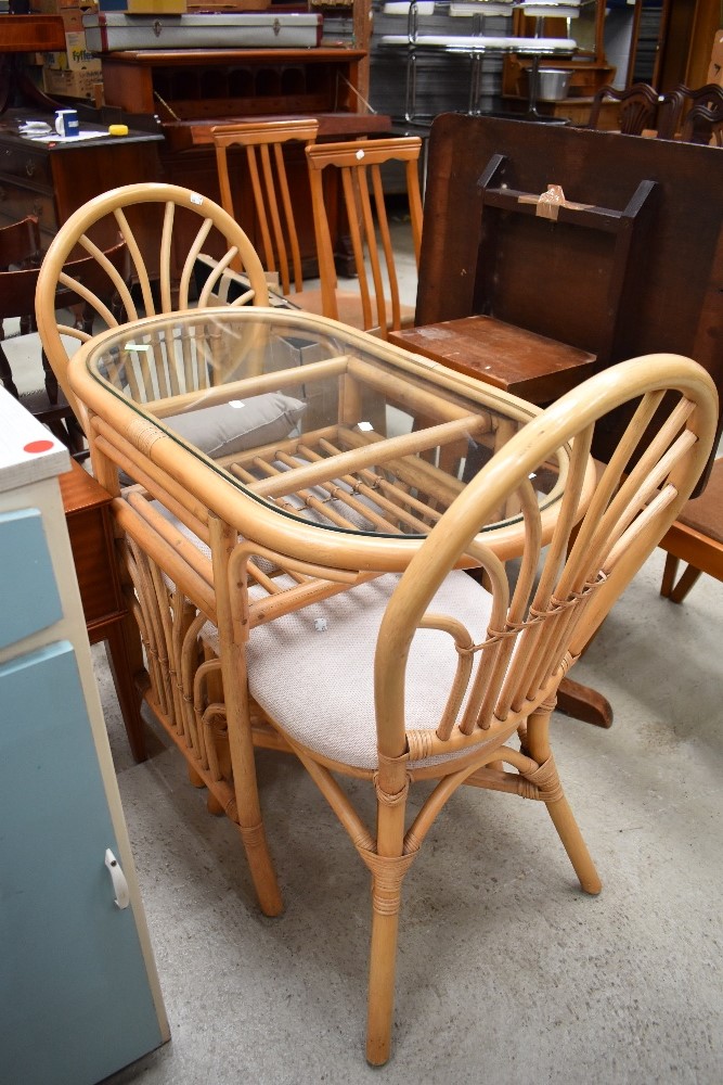 A mid century two seat breakfast table and chair set