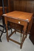 An early to mid 20th Century oak occasional table, having barley twist frame, approx. 46 x 46cm