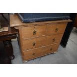 An Edwardian chest of two over three drawers in ash wood