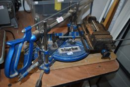 A Clarke bench mounted mitre saw
