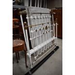 A Victorian style brass and painted bed stead including irons and base, width approx 153cm (5ft)