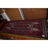 An antique middle eastern style Turkish rug or carpet bag having been hand woven