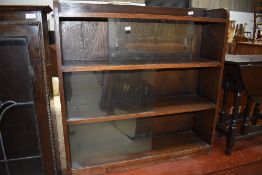 An early 20th Century oak bookcase (not stacking but in similar style) triple shelf, with sliding