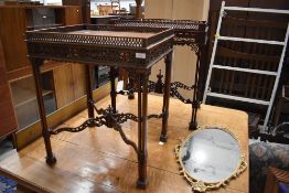 A near pair of reproduction mahogany galleried occasional tables