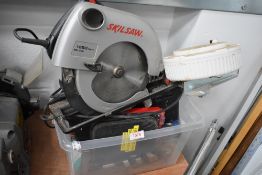 A selection of tools including circular saw