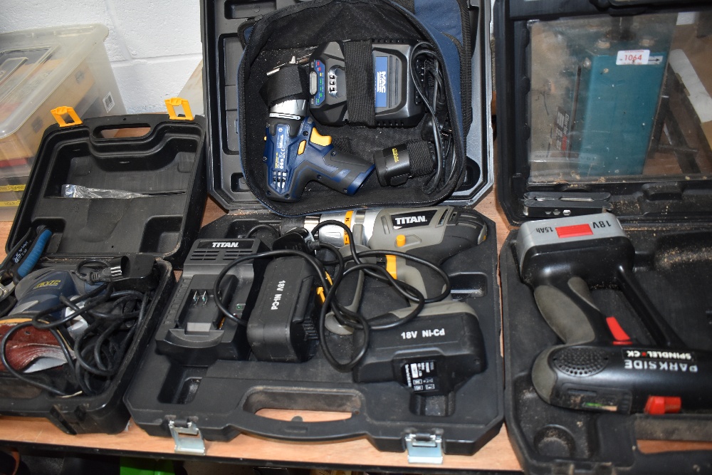 A selection of power drills drivers and hand sander