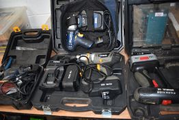 A selection of power drills drivers and hand sander