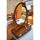 A modern reproduction dressing table mirror